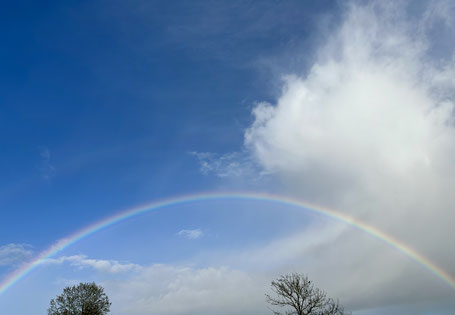 Himmel mit Regenbogen - Du bist ein Schlüssel für diese Welt